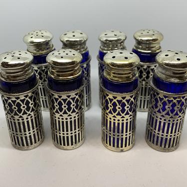 Vintage Antique set of 8 salt and pepper shakers