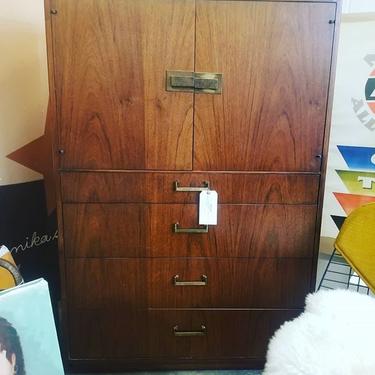 Mid Century Modern American Walnut "tall boy" chest of drawers. 54.25 inches high. 36inches wide. 19 inches deep. 