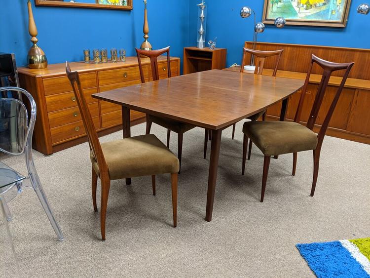 Mid-Century Modern walnut boat shape dining table with 2 leaves