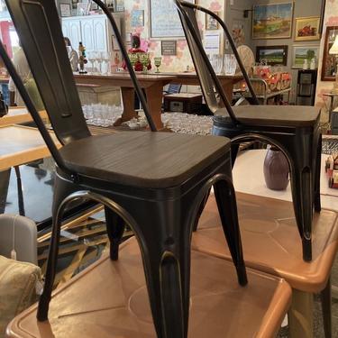 Black painted industrial chairs With wooden seats 