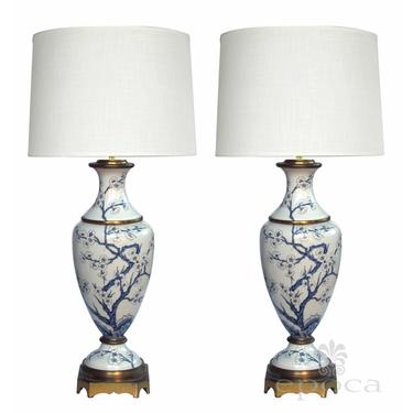 an elegant pair of paris porcelain blue and white hand-painted baluster-form lamps