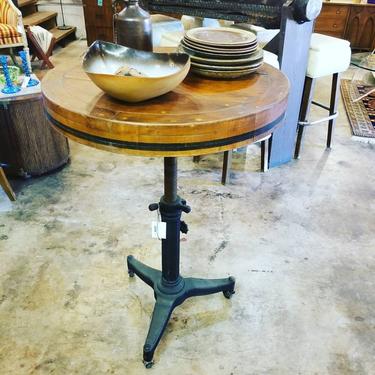 Height adjustable bistro table. Re-imagined Antique ship barrel on vintage revolving table base. $600