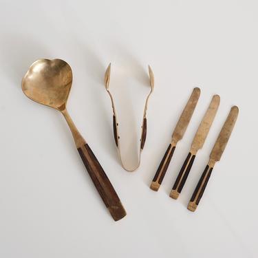 vintage brass and wood serving utensils 
