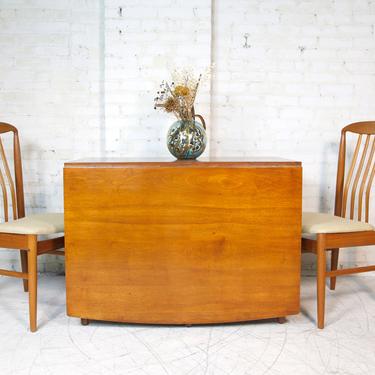 Vintage mcm walnut dining table by Drexel Declaration Kipp Stewart with drop leafs | Free delivery in NYC and Hudson Valley areas 