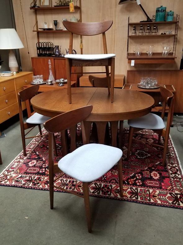 Set of four Mid-Century Modern dining chairs with floating wood backs