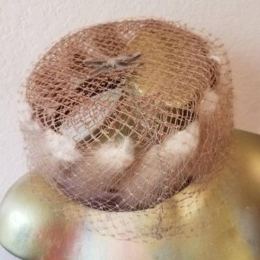 Pill box hat with brown mink and netting, 1950's 