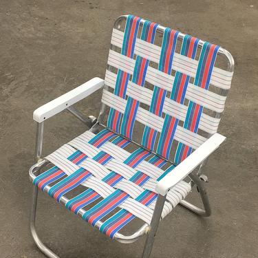 Vintage Lawn Chair Retro 1990s Silver Aluminum Frame + Woven + Webbed Straps + Blue + Pink + White + Plastic Armrests + Folds Up + Patio 