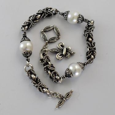 Edgy 80's oxidized sterling braided rope pearl fleur de lis charm bracelet, ornate 925 silver pearls twisted Gothic stacker 
