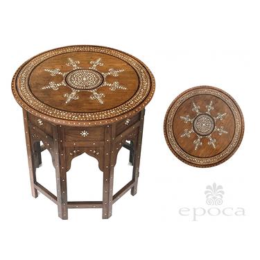 an intricately inlaid anglo indian circular traveling table on an octagonal base