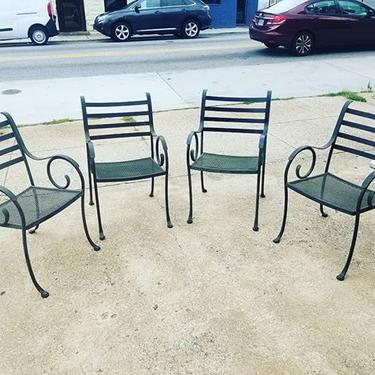                   Set of 4 wrought iron outdoor chairs.