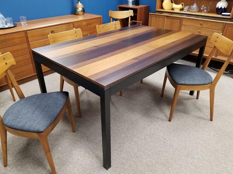 Mid-Century Modern mixed wood dining table by Milo Baughman for Directional with one large leaf