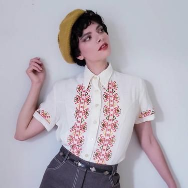 1970s Embroidered Button Down Peasant Shirt / 70s Short Sleeved White Blouse Multicolored Folk Pattern Cross Stitch / M L / Donovan 