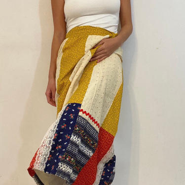 70s wrap calico maxi skirt / vintage cotton calico floral print patchwork quilt hostess resort wear ric rack maxi wrap skirt | 27-29 W 