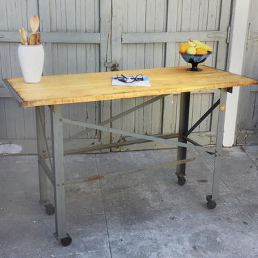 Vintage industrial rolling counter height table