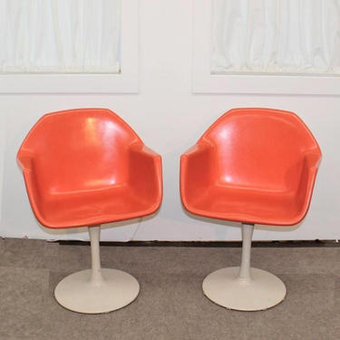 Mid Century Modern tulip base fiberglass chairs 