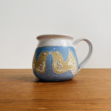 Vintage bird mug / handmade studio pottery blue and white mug signed VM 