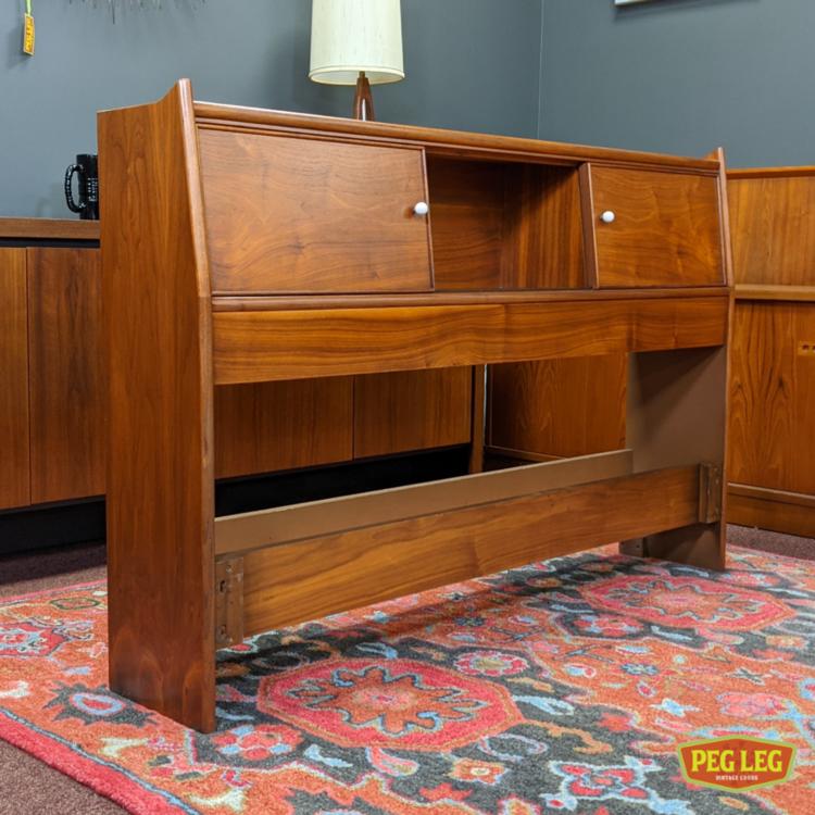 Mid-Century Modern full-size walnut storage headboard from the 'Declaration' collection by Drexel