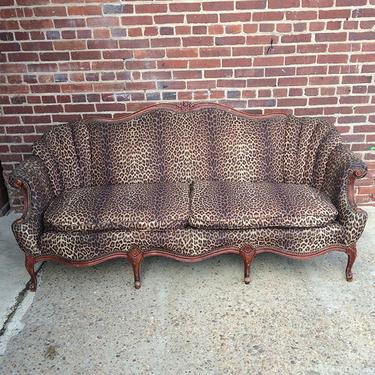 Funky vintage love seat with animal print upholstery