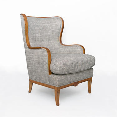 Swedish Grace, Art Deco large wingback chair with carved stolid birch frame.
