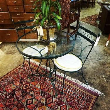 Glass top bistro table with two chairs 