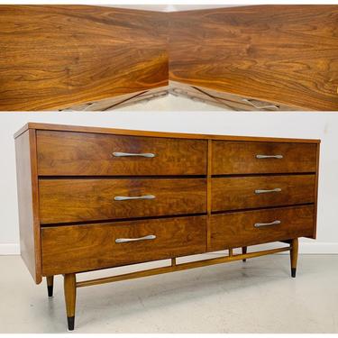 mid century modern walnut and oak low dresser from the Lane Acclaim collection by designer Andre Bus 