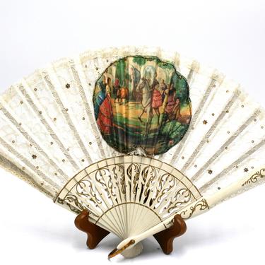 vintage lace hand fan with wood ribs and south american theme 