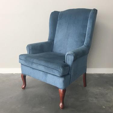vintage blue wingback chair.