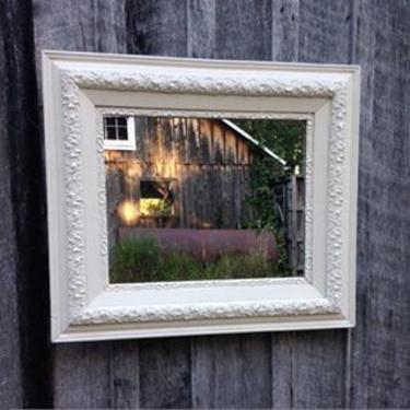 Gorgeous antique frame with new mirror. Can be hung vertically or horizontally. Dims: 25