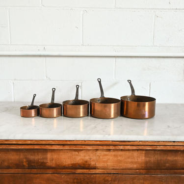 set of vintage french copper pots