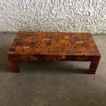 Pounded copper patchwork coffee table; late mid-century, design by Paul Evans