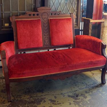Red Velvet Loveseat w Carved Accents