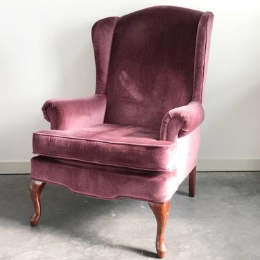 vintage plush rose pink wingback chair.
