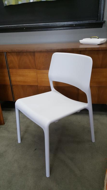 Molded white plastic chair from the Spark Series by Don Chadwick for Knoll
