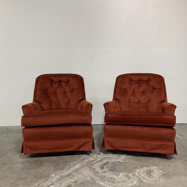 Pair of red vintage tufted chairs