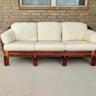Comfortable Vintage Rattan 3-Seat Sofa with Removable and Zippered Ivory Cushions in Excellent Condition 