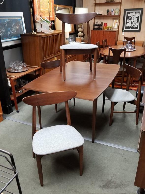 Set of four Mid-Century Modern walnut dining chairs with floating backs