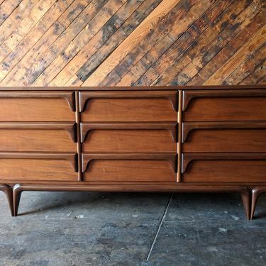 Mid Century Refinished Walnut Sculpted Dresser by Basset 