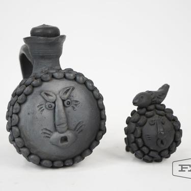 2 Black Clay Lion Figurines