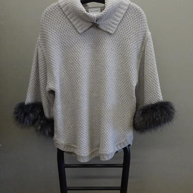 Stizzoli grey wool sweater with fox cuffs 