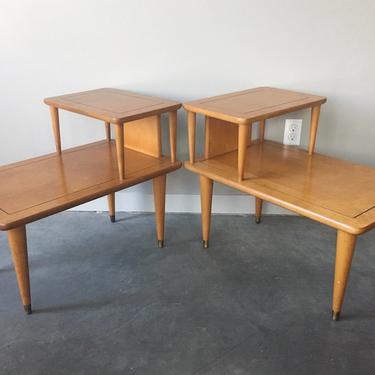 pair of vintage mid century modern tiered end tables.