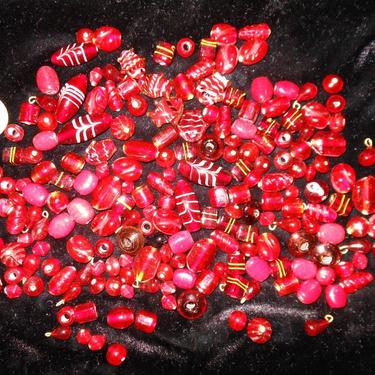 11 ounces of Assorted Shapes & Sizes Red Glass beads from India 