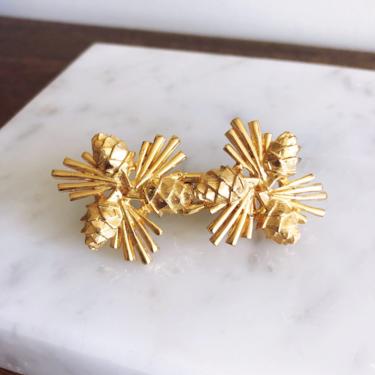 Vintage 1979 Mimi Di N gold belt buckle with pine cones 