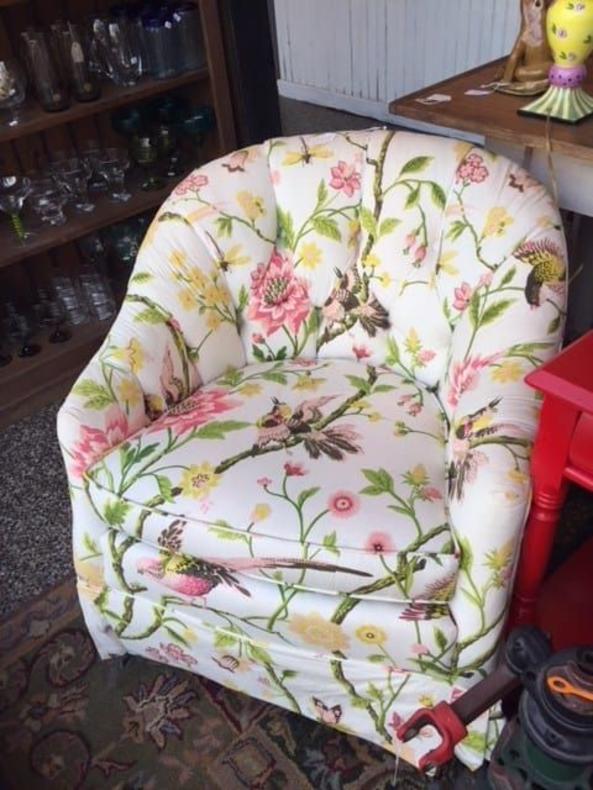 Floral upholstered chair. $250