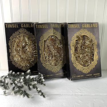 Gold tinsel garland - 3 boxes - 3&quot; x 21' - 1970s vintage 