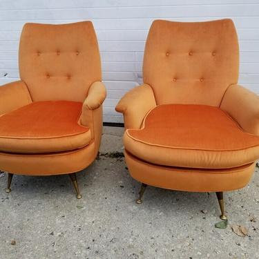Vintage Chic Pair of Mid Century Modern Italian Brass Tip Swivel Lounge Chairs Original Orange Fabric