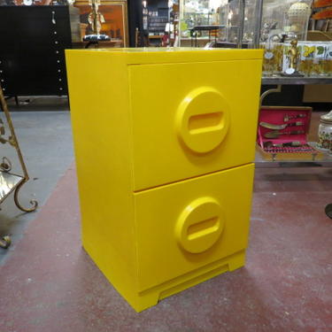 Vintage MCM Akro Mills yellow plastic file cabinet