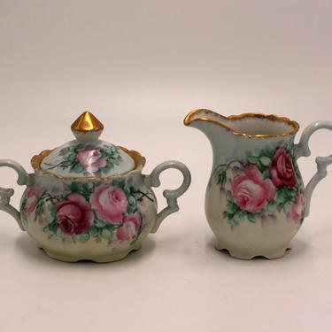 vintage porcelain hand painted cream and sugar bowl 