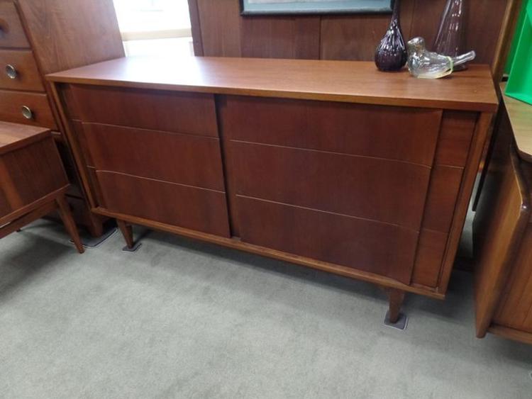 Mid-Century Modern Walnut dresser with sculpted drawer fronts