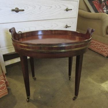 ANTIQUE ENGLISH SMALL OVAL MAHOGANY TRAY TABLE WITH BRASS DETAIL AND CASTERS