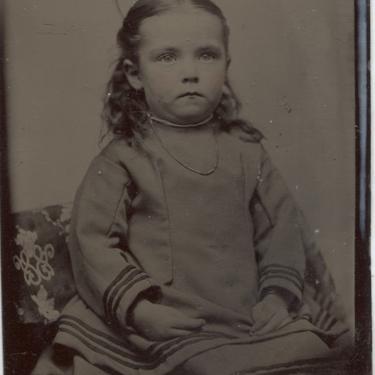 Tintype Photograph of a Frowning Young Girl 